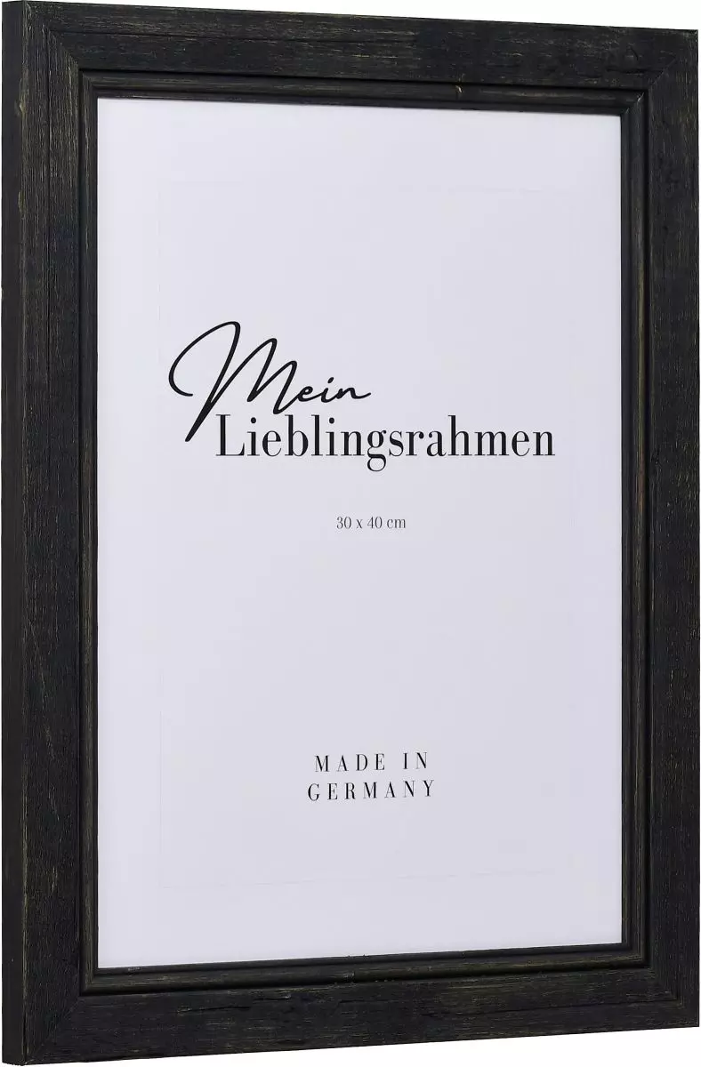 Seitenansicht eines schwarzen, offenporig lackierten Holzrahmens mit Flachprofil und Rundstab an der Innenkante